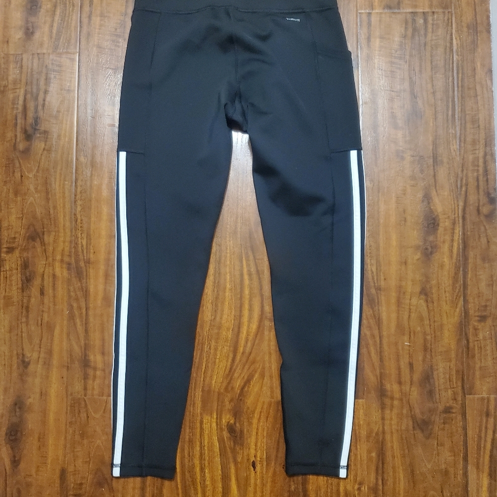 Adidas climalite leggings with pocket size med.